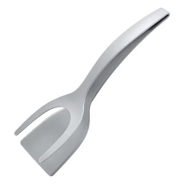 Ingénieuse pince-spatule de cuisine 2 en 1 en nylon résistant à la chaleur 220°C, ustensile multifonction pour œufs, crêpes, steaks, fritures, grillades et poêles antiadhésives. Livraison offerte !