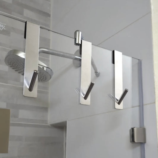 Crochet en acier inoxydable pour porte de douche en verre, installation sans perçage, design moderne antirayures, idéal pour suspendre serviettes, peignoirs et accessoires de salle de bain. Livraison offerte !