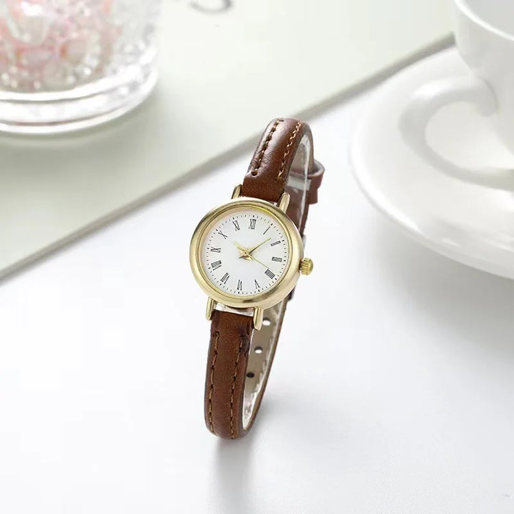 Élégante montre pour femme avec cadran romain et bracelet en cuir, plusieurs couleurs disponibles. Livraison prioritaire offerte !