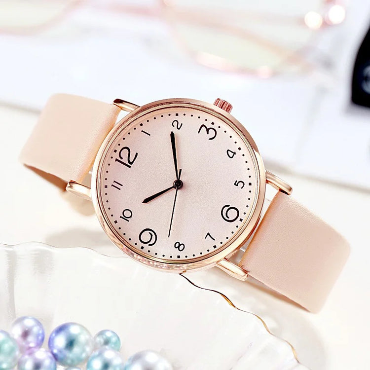 Montre pour femme avec cadran classique et bracelet rose poudré. Livraison prioritaire offerte !
