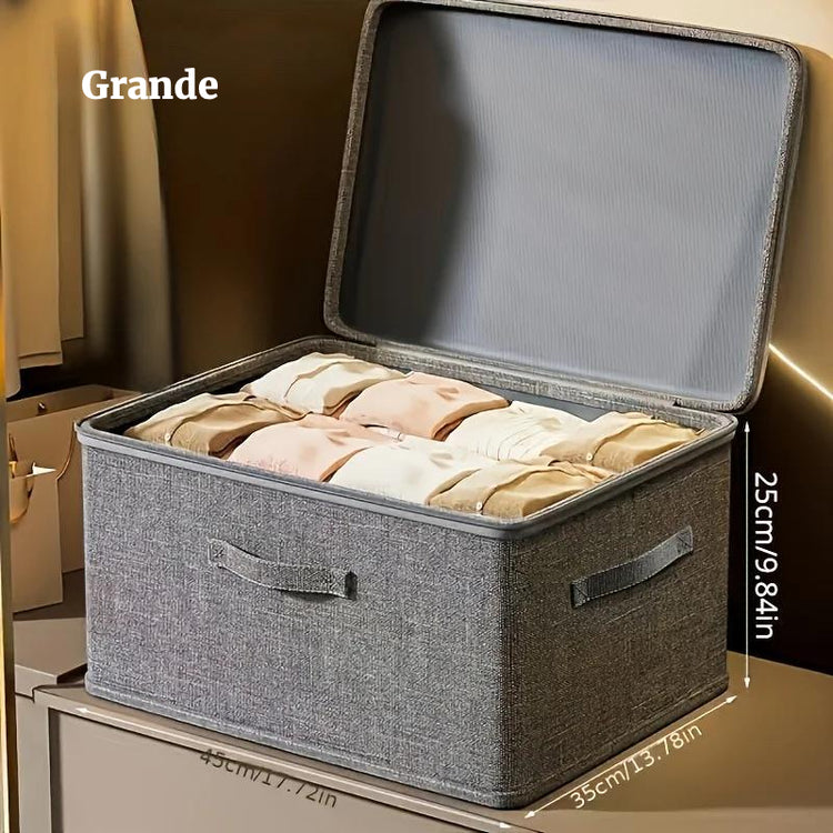 Boîte de rangement pliable multifonctionnelle en tissu imperméable avec couvercle zippé à double sens, grande capacité pour vêtements, couettes, oreillers, solution gain de place et protection optimale. Livraison offerte !