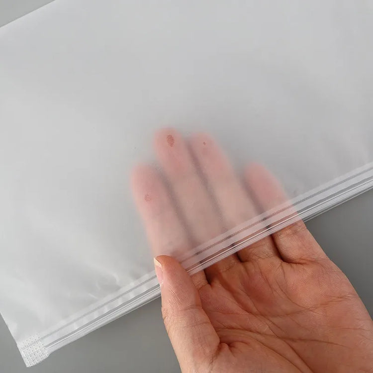 Sacs de rangement transparents avec anneau de traction 23×14 cm, multifonctionnels et étanches, pochettes zippées pour bijoux, cosmétiques, câbles, papeterie et petits articles, réutilisables et portables. Livraison offerte !