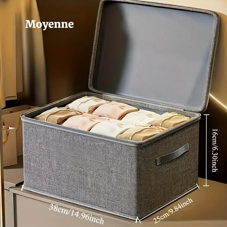 Boîte de rangement pliable multifonctionnelle en tissu imperméable avec couvercle zippé à double sens, grande capacité pour vêtements, couettes, oreillers, solution gain de place et protection optimale. Livraison offerte !