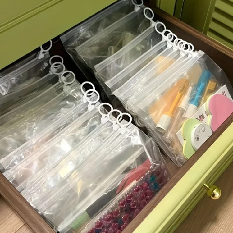Sacs de rangement transparents avec anneau de traction 23×14 cm, multifonctionnels et étanches, pochettes zippées pour bijoux, cosmétiques, câbles, papeterie et petits articles, réutilisables et portables. Livraison offerte !