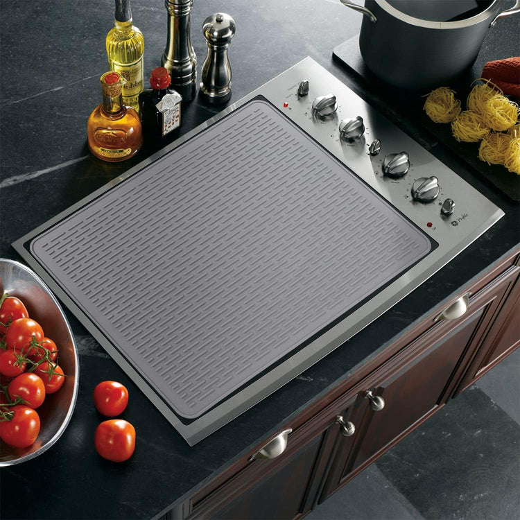 Housse de protection extra grande 71x50 cm, tapis en silicone pour cuisinière et comptoir : résistante aux rayures et à la chaleur, facile à nettoyer, multi-usage. Un indispensable pour chaque cuisine. La livraison prioritaire est offerte !