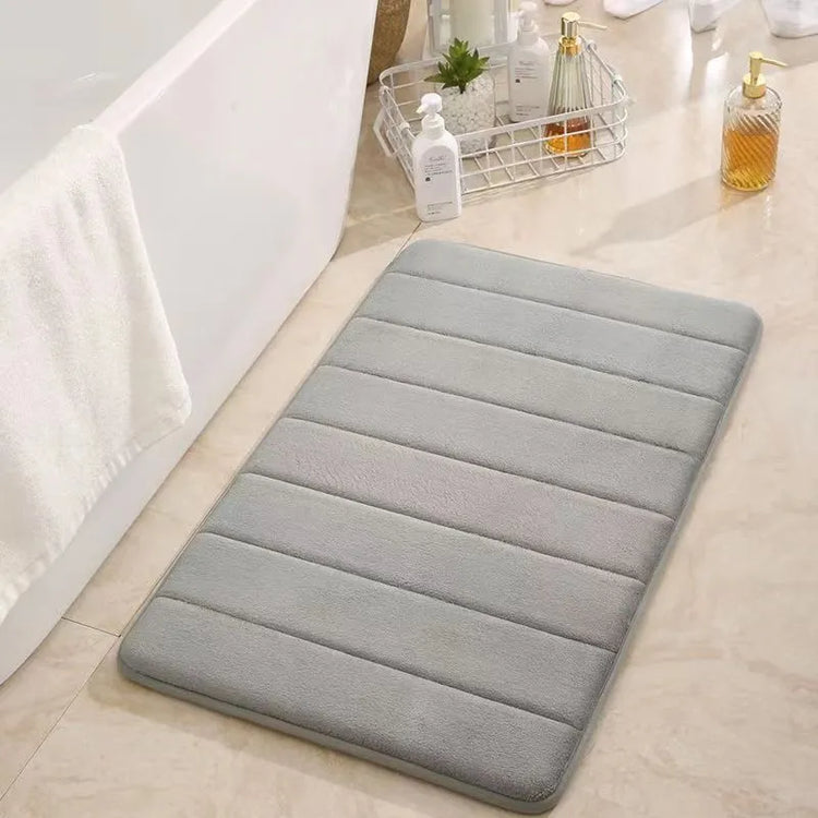 Magnifique tapis de bain en mousse à mémoire de forme, ultra confortable, antidérapant, absorbant et lavable en machine. La livraison est offerte !