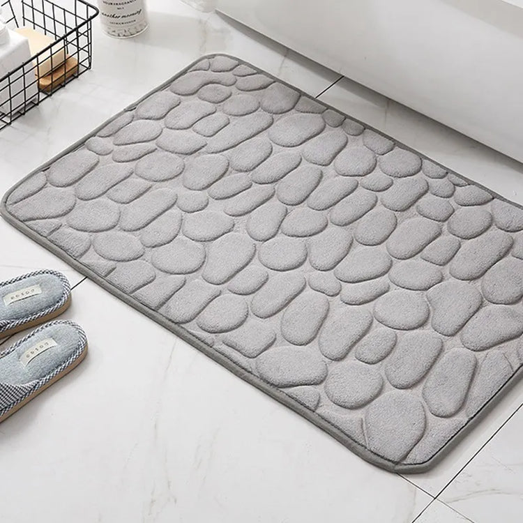 Superbe tapis de bain antidérapant en mousse à mémoire de forme, ultra confortable et douillet, lavable en machine. La livraison est offerte!