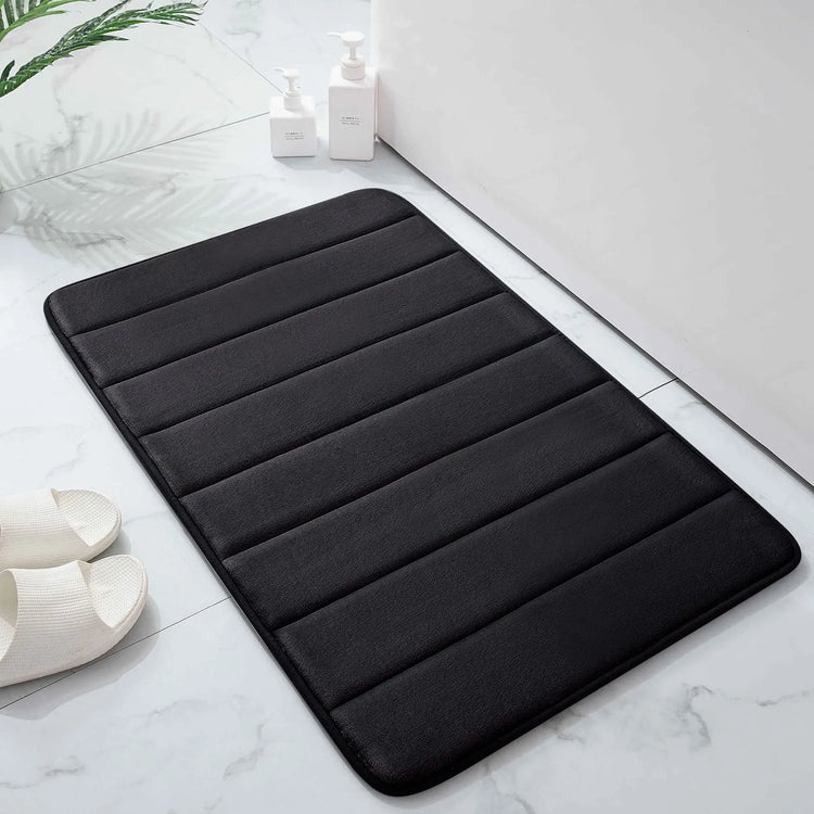 Magnifique tapis de bain en mousse à mémoire de forme, ultra confortable, antidérapant, absorbant et lavable en machine. La livraison est offerte !