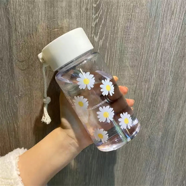 Jolie bouteille d'eau transparente en plastique de 500 ml - sans BPA, gourde sportive portable avec corde, motif à fleurs. La livraison prioritaire est offerte !