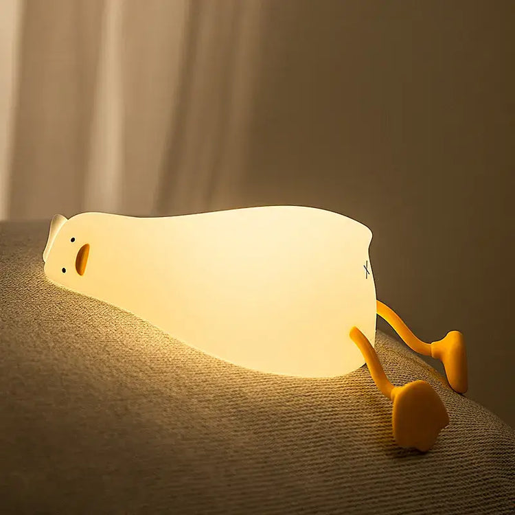 Amusante lampe veilleuse en forme de canard au repos, silicone souple, 3 intensités, veilleuse réconfortante, mignonne et humoristique, rechargeable via câble inclus. Pour les jeunes de cœur, de l'enfance à l'âge adulte. La livraison est incluse !