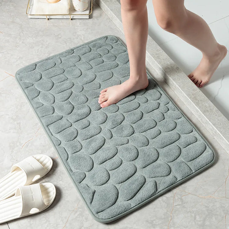 Superbe tapis de bain antidérapant en mousse à mémoire de forme, ultra confortable et douillet, lavable en machine. La livraison est offerte!